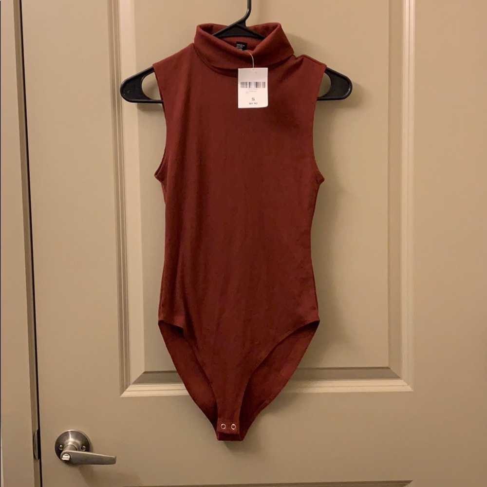 Rust colored turtleneck bodysuit